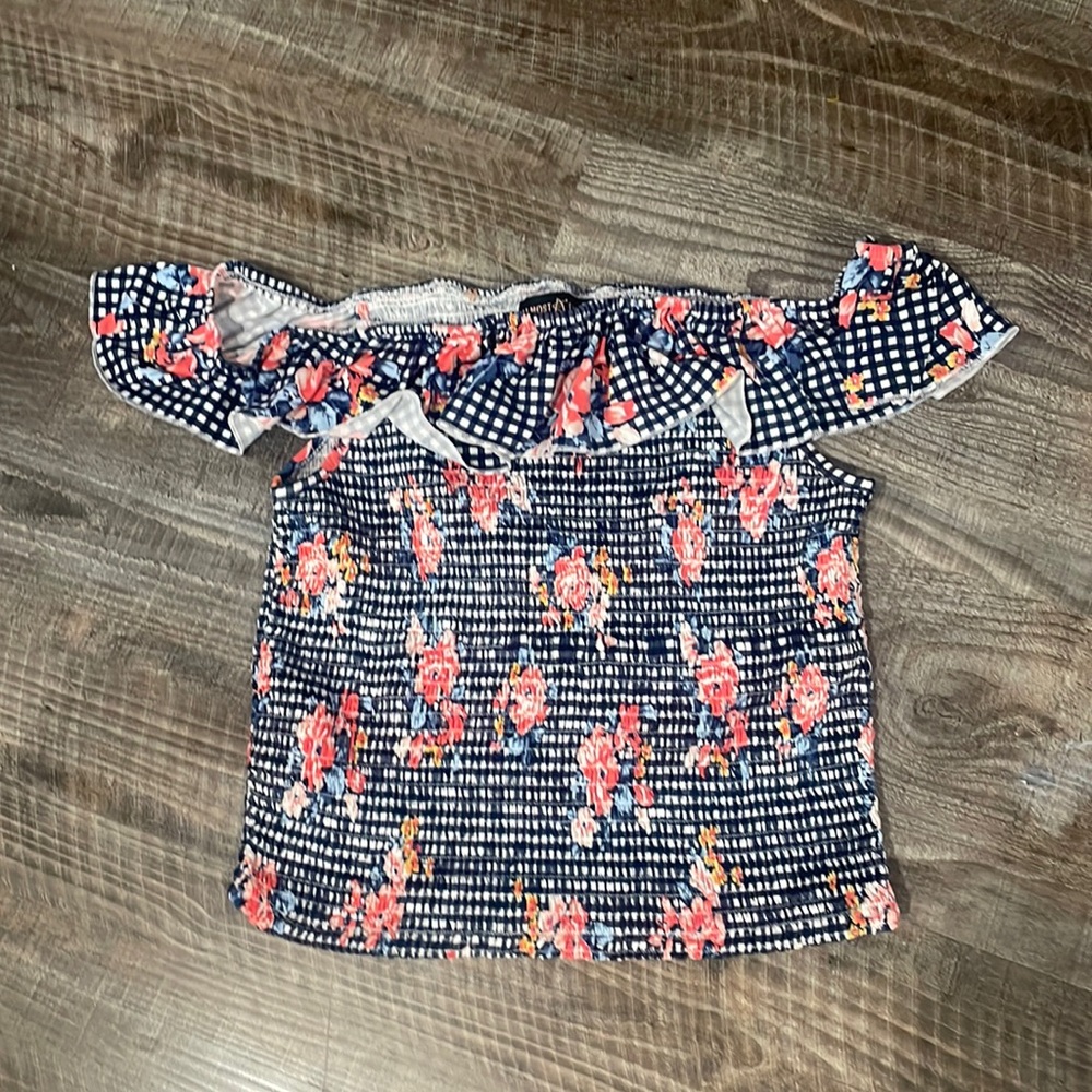 A multi color very stretchy top. Asking 10 dollars for it!